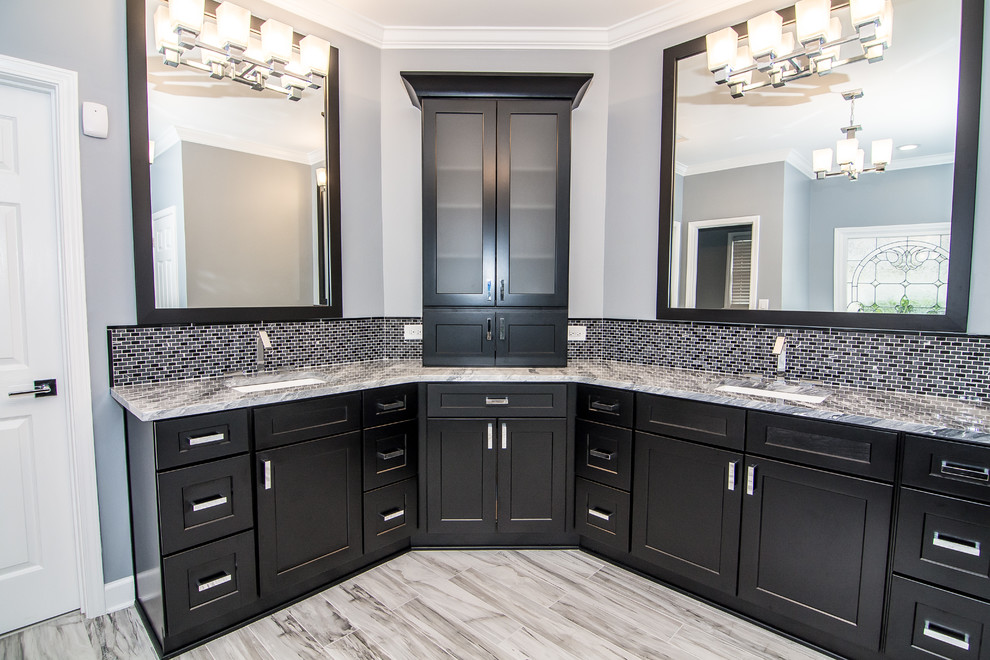 This is an example of a large modern ensuite bathroom in Atlanta with a submerged sink, shaker cabinets, black cabinets, marble worktops, a built-in bath, a corner shower, white tiles, porcelain tiles, grey walls and porcelain flooring.
