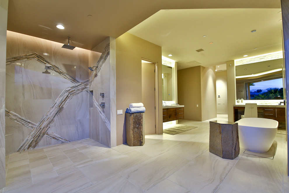 Example of a huge trendy master white tile and porcelain tile porcelain tile and beige floor bathroom design in Los Angeles with flat-panel cabinets, dark wood cabinets, a one-piece toilet, beige walls, an undermount sink and granite countertops