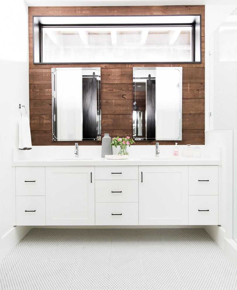 Example of a transitional bathroom design in Salt Lake City with flat-panel cabinets, white cabinets, white walls and a drop-in sink