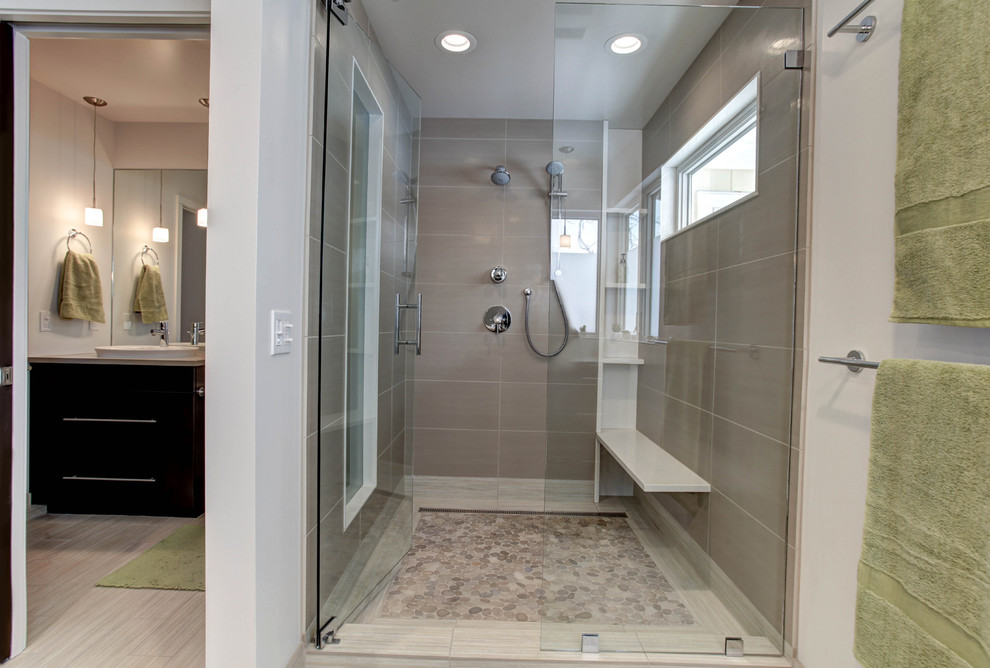 Large minimalist master ceramic tile alcove shower photo in Grand Rapids with a vessel sink, flat-panel cabinets, dark wood cabinets, quartz countertops and white walls