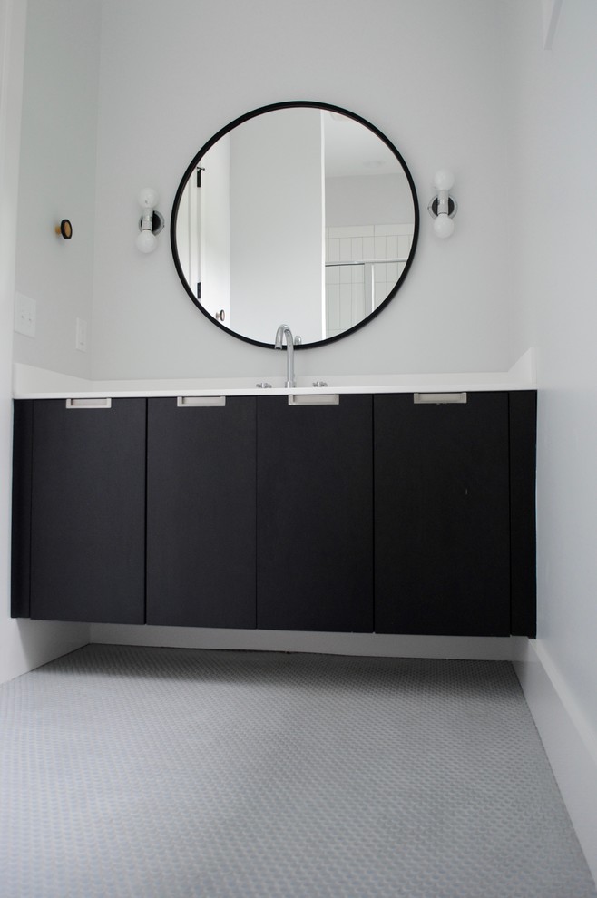 Idéer för ett mellanstort skandinaviskt badrum med dusch, med släta luckor, svarta skåp, grå kakel, keramikplattor, grå väggar, klinkergolv i keramik och bänkskiva i kvarts