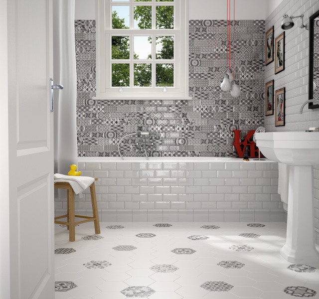 Inspiration for a medium sized scandi family bathroom in Chicago with white tiles, ceramic tiles, a built-in bath, a shower/bath combination, white walls, ceramic flooring and a pedestal sink.