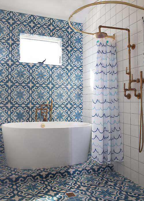 Mediterranean Marvel: Blue Cement Tiles and Brass Accents with Bathroom Curtain Ideas