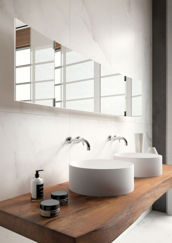 Photo of a large modern ensuite bathroom in Miami with white tiles, porcelain tiles, white walls, porcelain flooring, wooden worktops, a vessel sink and white floors.