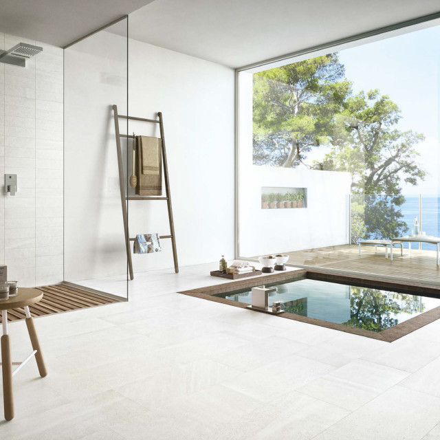 Modern white bathroom with white stone look porcelain tiles - Modern ...