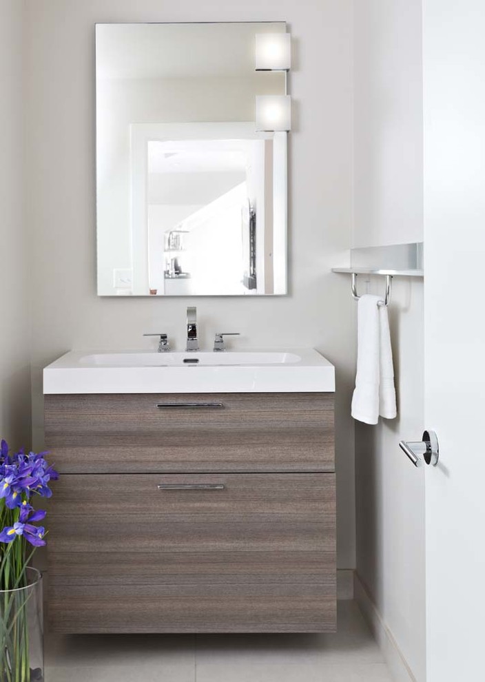 Inspiration for a medium sized contemporary bathroom in Chicago with freestanding cabinets, grey cabinets, engineered stone worktops and porcelain flooring.