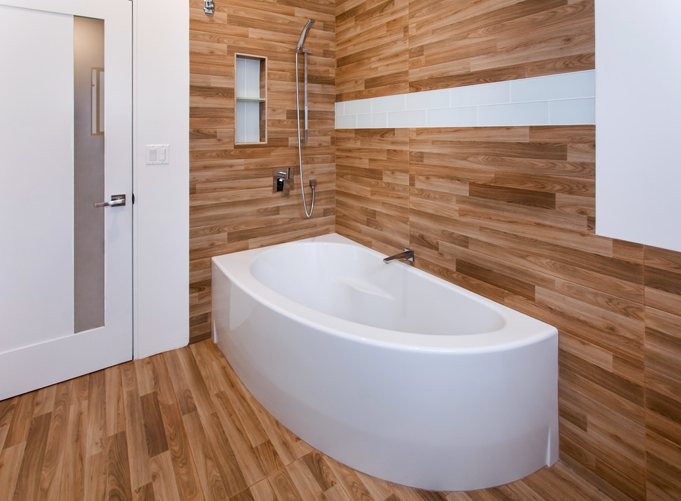 Medium sized modern shower room bathroom in Los Angeles with flat-panel cabinets, white cabinets, an alcove bath, a one-piece toilet, brown tiles, porcelain tiles, white walls, porcelain flooring, a submerged sink and engineered stone worktops.