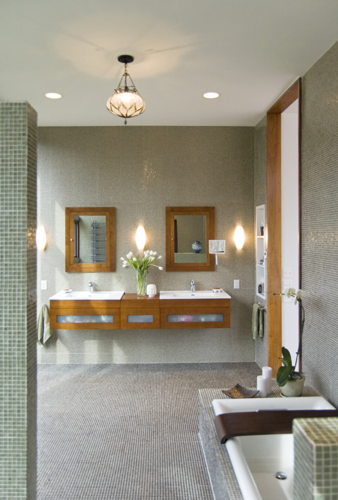 Modern bathroom in Philadelphia with mosaic tiles and feature lighting.