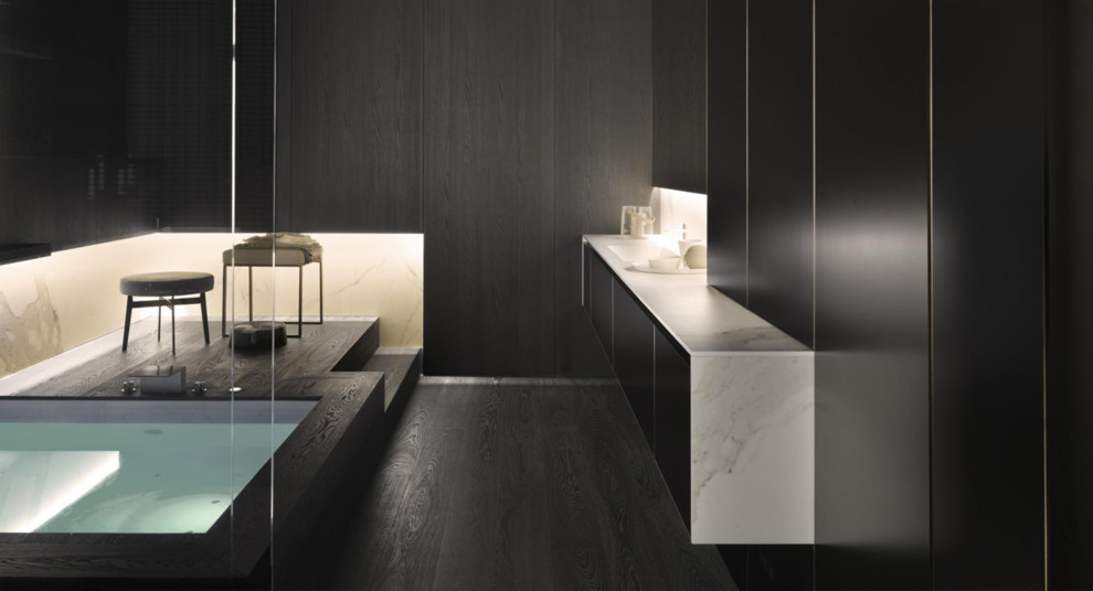 Свежая идея для дизайна: ванная комната в стиле модернизм с гидромассажной ванной и подвесной раковиной - отличное фото интерьера