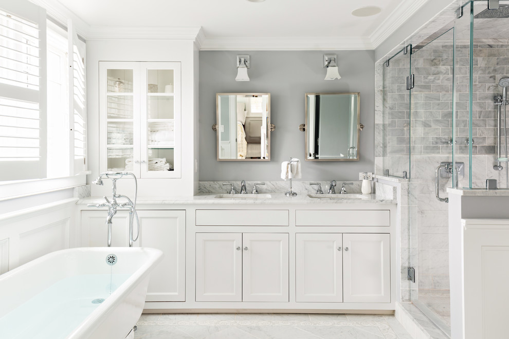 Bathroom - mid-sized coastal master white tile and mosaic tile mosaic tile floor bathroom idea in Boston with an undermount sink, white cabinets, marble countertops, a one-piece toilet, gray walls and recessed-panel cabinets