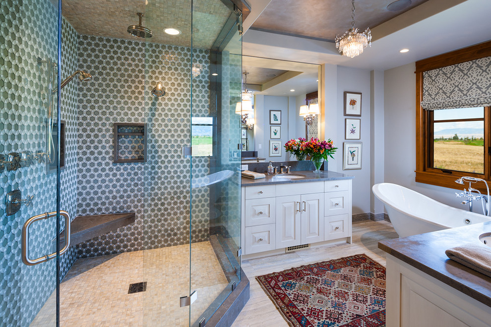 Trendy gray tile bathroom photo in Other with an undermount sink, raised-panel cabinets and white cabinets
