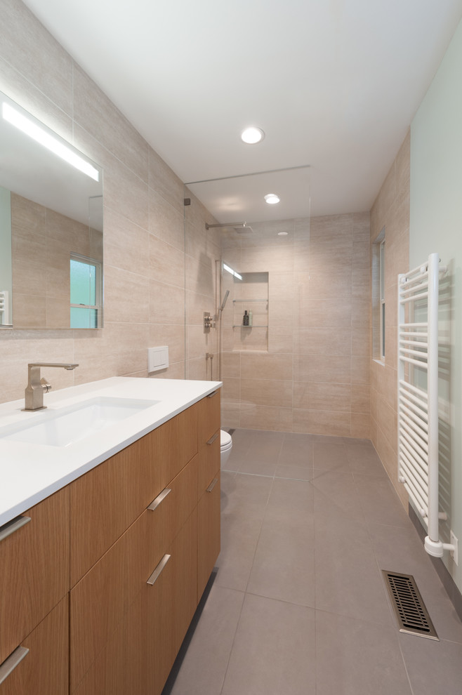 Design ideas for a modern bathroom in San Francisco with a wall-mounted sink, flat-panel cabinets, light wood cabinets, engineered stone worktops, a built-in shower, beige tiles, ceramic tiles, beige walls and porcelain flooring.