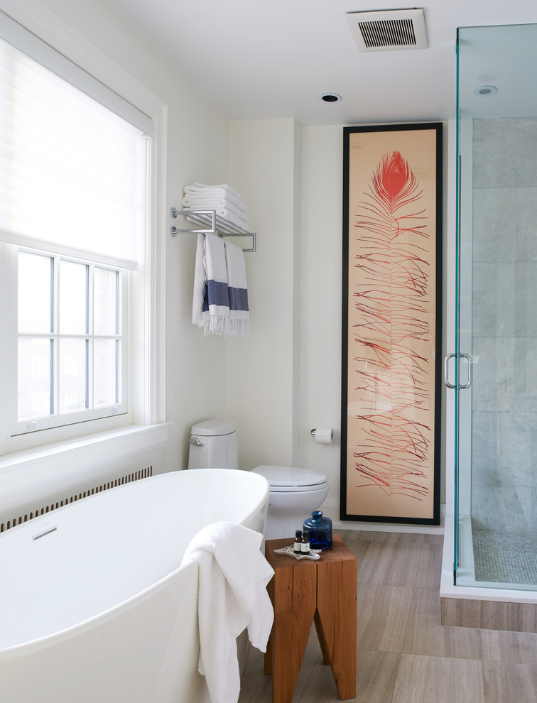 Example of a mid-sized transitional master gray tile and marble tile porcelain tile and beige floor bathroom design in Toronto with a two-piece toilet, white walls and a hinged shower door