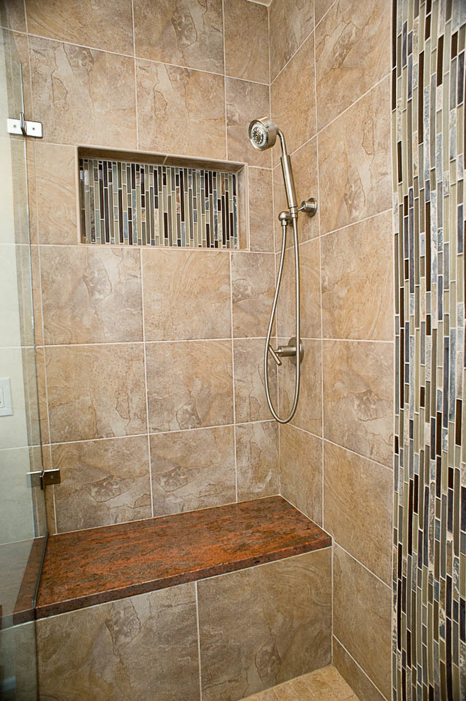 Inspiration for a mid-sized transitional master beige tile and ceramic tile porcelain tile bathroom remodel in Philadelphia with a trough sink, flat-panel cabinets, dark wood cabinets and a two-piece toilet