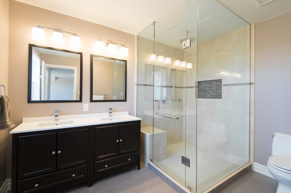 Photo of a medium sized classic ensuite bathroom in Toronto with shaker cabinets, dark wood cabinets, beige tiles, ceramic tiles and engineered stone worktops.