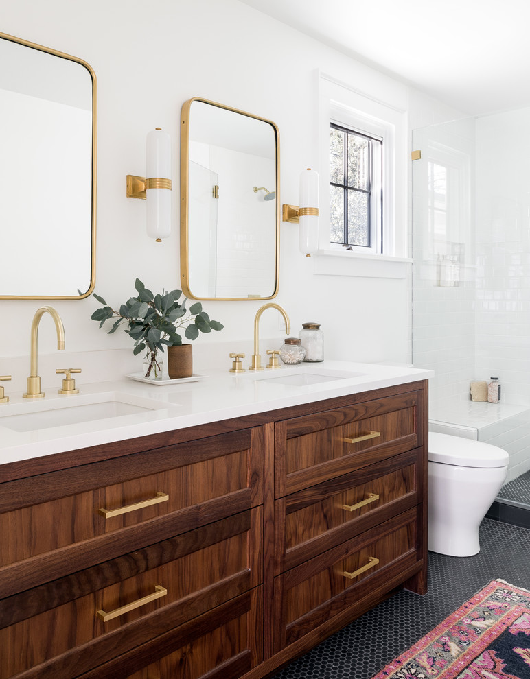 Inspiration for a classic shower room bathroom in Seattle with shaker cabinets, dark wood cabinets, an alcove shower, a submerged sink, black floors, a hinged door and white worktops.