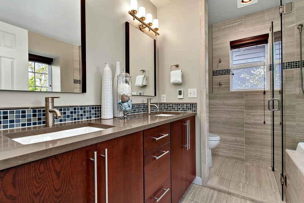 Example of a large master gray tile and ceramic tile ceramic tile bathroom design in Seattle with flat-panel cabinets, dark wood cabinets, beige walls, an undermount sink and quartz countertops