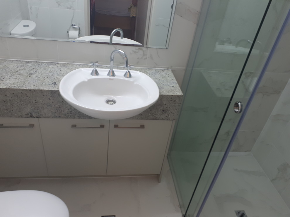 This is an example of a contemporary bathroom in Sunshine Coast with a walk-in shower, terrazzo flooring and an open shower.
