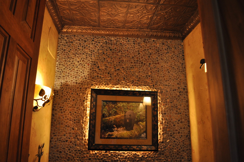 Mid-sized mountain style 3/4 ceramic tile bathroom photo in Orange County with a one-piece toilet, beige walls and a vessel sink