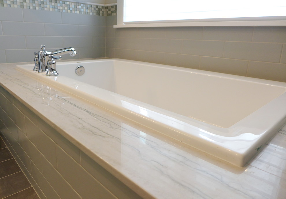 This is an example of a bathroom in Salt Lake City with granite worktops.