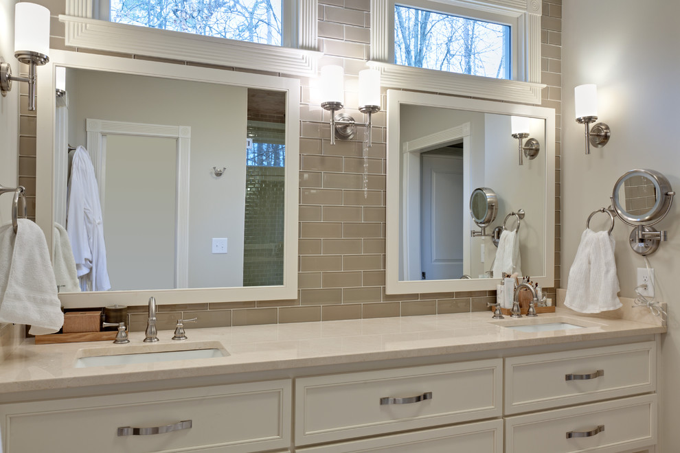 Inspiration for a medium sized classic ensuite bathroom in Atlanta with white cabinets, an alcove shower, beige tiles, ceramic tiles, grey walls, a submerged sink, engineered stone worktops, a hinged door, ceramic flooring, beige floors and recessed-panel cabinets.