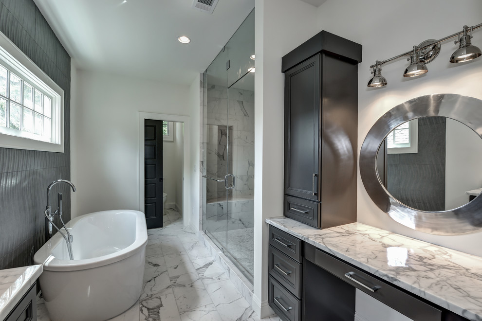 Large contemporary ensuite bathroom in Atlanta with recessed-panel cabinets, grey cabinets, a freestanding bath, an alcove shower, white walls, marble flooring, a submerged sink and marble worktops.