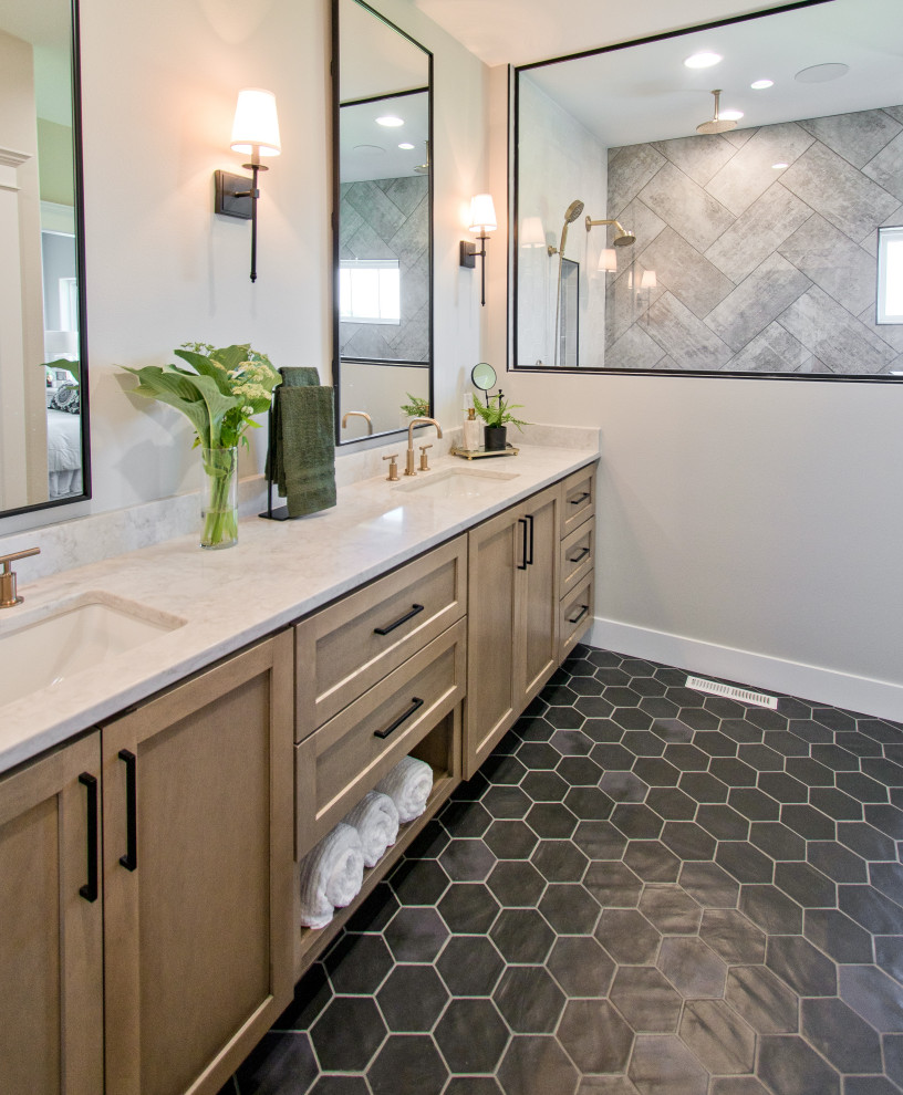 Bathroom - farmhouse master porcelain tile porcelain tile, black floor and double-sink bathroom idea with recessed-panel cabinets, light wood cabinets, white walls, an undermount sink, quartz countertops, white countertops and a built-in vanity