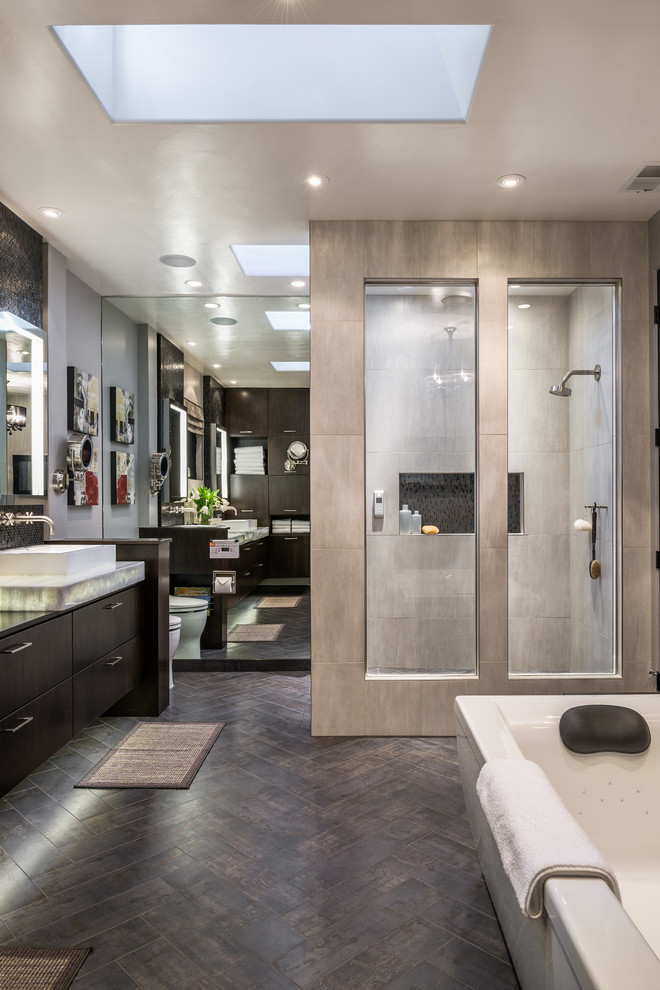 Inspiration for a large contemporary master multicolored tile and porcelain tile porcelain tile and brown floor bathroom remodel in San Francisco with a vessel sink, flat-panel cabinets, dark wood cabinets, a one-piece toilet, gray walls and a hinged shower door