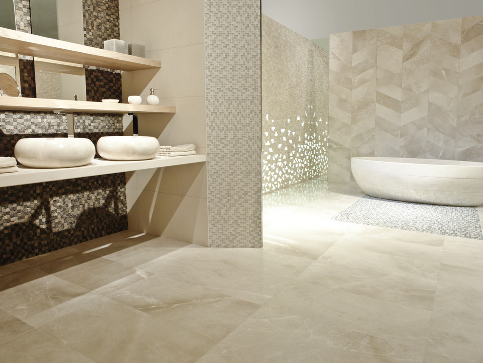 Freestanding bathtub - large contemporary master beige tile and porcelain tile porcelain tile and beige floor freestanding bathtub idea in New York with beige walls and a vessel sink