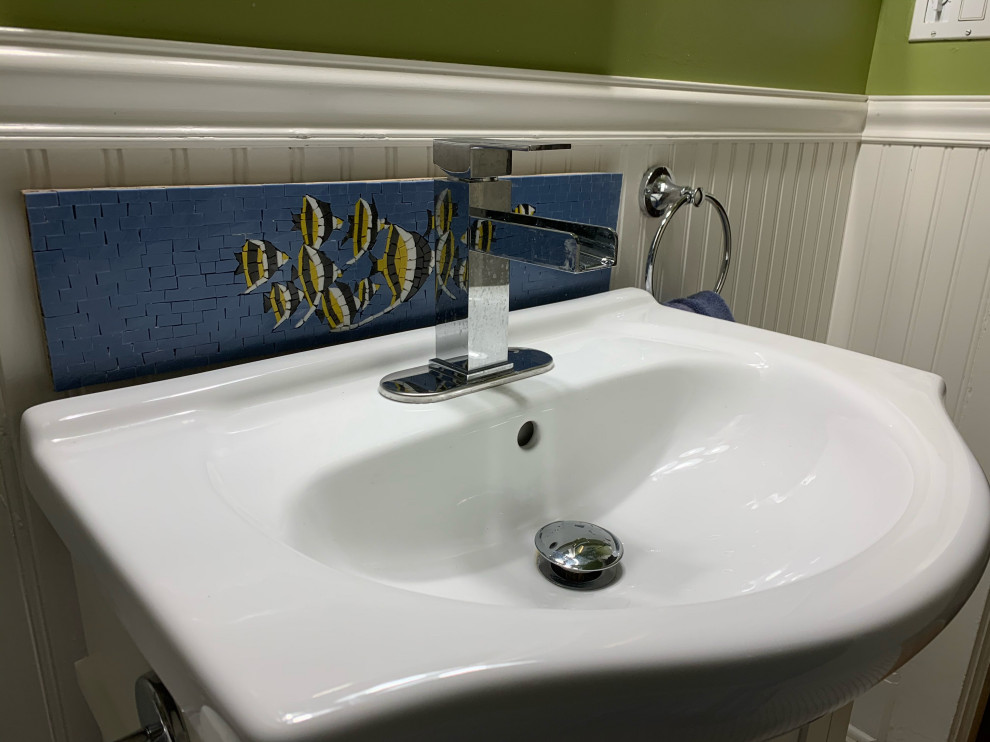 This is an example of a beach style bathroom in Chicago with blue tiles and mosaic tiles.