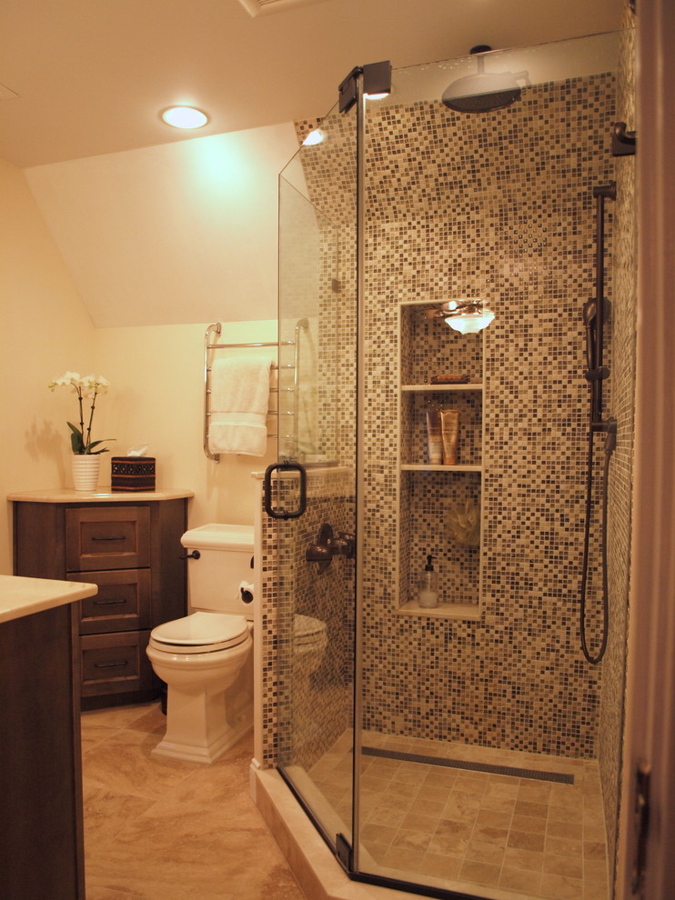 Inspiration for a medium sized mediterranean ensuite bathroom in Newark with flat-panel cabinets, medium wood cabinets, a corner shower, a two-piece toilet, multi-coloured tiles, mosaic tiles, beige walls, ceramic flooring, a submerged sink, engineered stone worktops, beige floors and a hinged door.