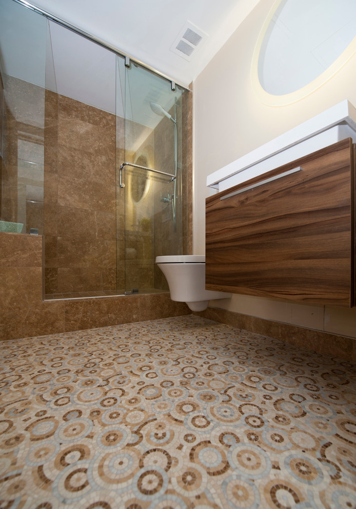 Bathroom - small modern master mosaic tile mosaic tile floor bathroom idea in Toronto with an integrated sink, flat-panel cabinets, dark wood cabinets, a wall-mount toilet and white walls