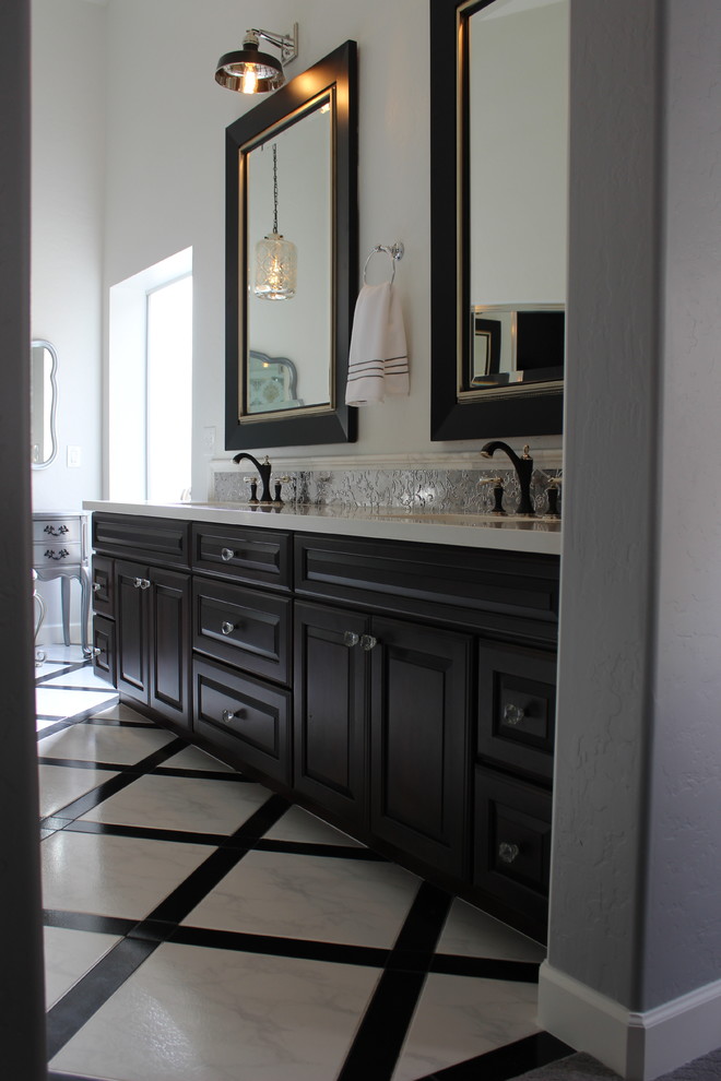 Example of a mid-sized transitional master multicolored tile bathroom design in Phoenix with raised-panel cabinets, dark wood cabinets and quartz countertops