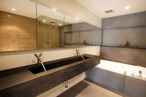 Bathroom - large modern master limestone floor bathroom idea in San Francisco with a trough sink