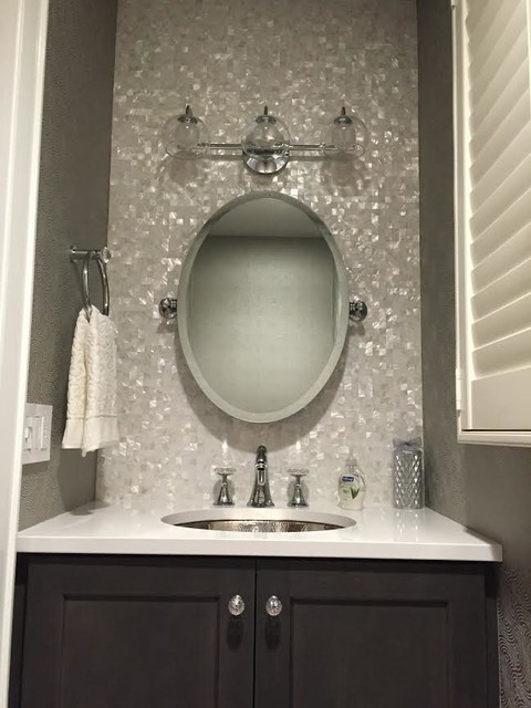 mother of pearl backsplash bathroom