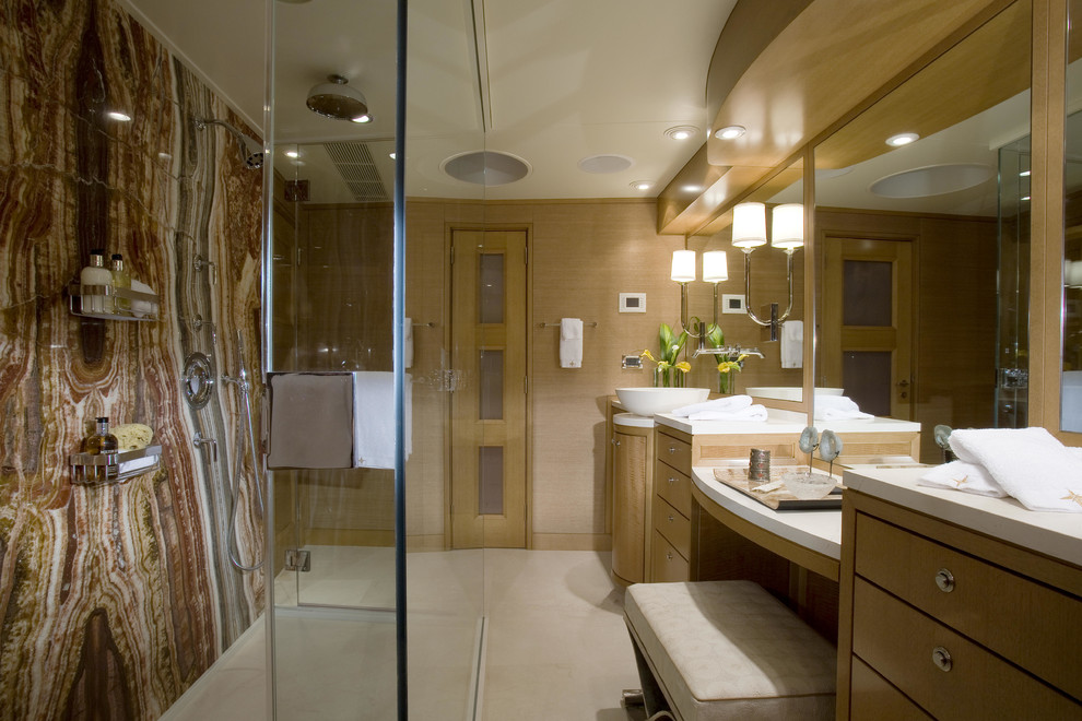 Traditional bathroom in Seattle with flat-panel cabinets and medium wood cabinets.