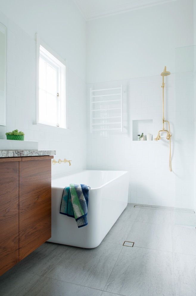 Example of a mid-century modern bathroom design in Perth