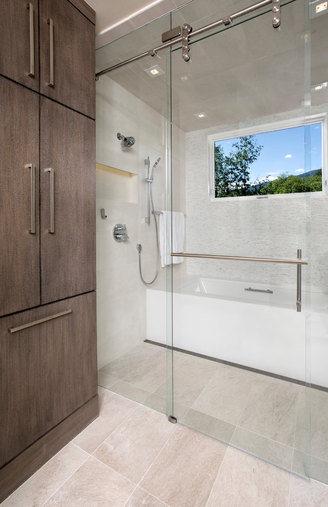 Example of a large trendy master white tile and matchstick tile walk-in shower design in Denver with an integrated sink, flat-panel cabinets, medium tone wood cabinets, solid surface countertops, a hot tub, a two-piece toilet and white walls