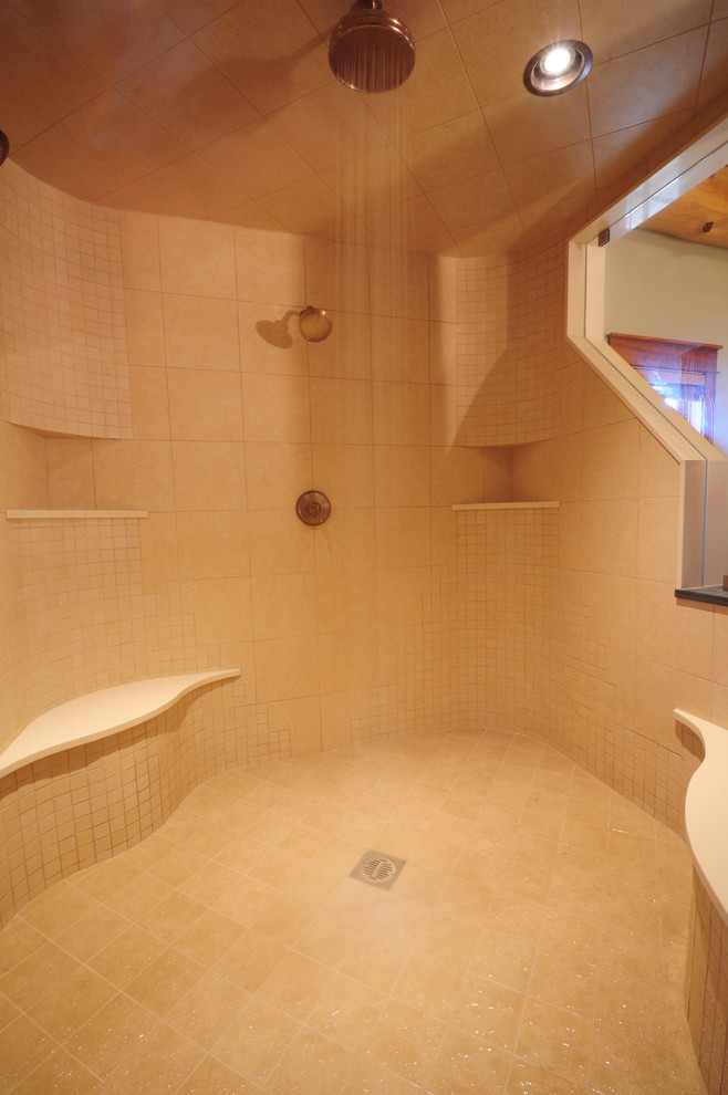 На фото: ванная комната в стиле рустика с стеклянной столешницей, двойным душем, бежевой плиткой и керамогранитной плиткой с