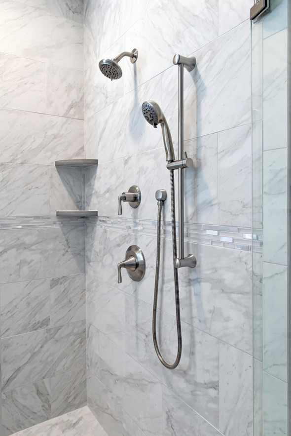 Inspiration for a medium sized contemporary ensuite bathroom in Charleston with shaker cabinets, grey cabinets, a freestanding bath, a corner shower, grey tiles, porcelain tiles, grey walls, porcelain flooring, a submerged sink, engineered stone worktops, grey floors and a hinged door.