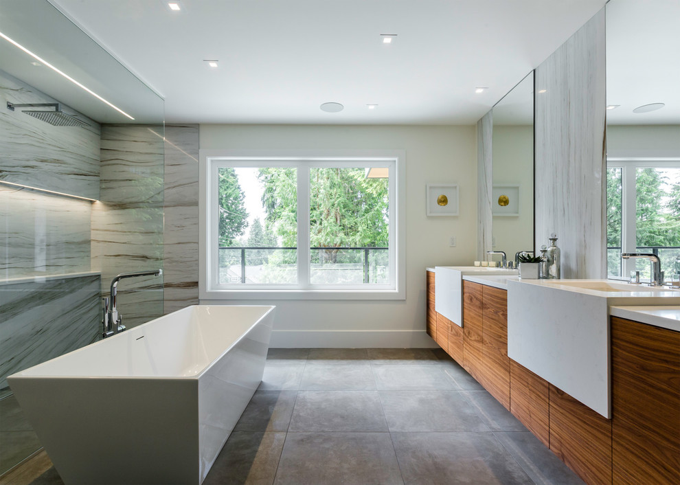 Inspiration for a large modern master cement tile floor and gray floor bathroom remodel in Vancouver with flat-panel cabinets, medium tone wood cabinets, white walls, an undermount sink, quartzite countertops and white countertops