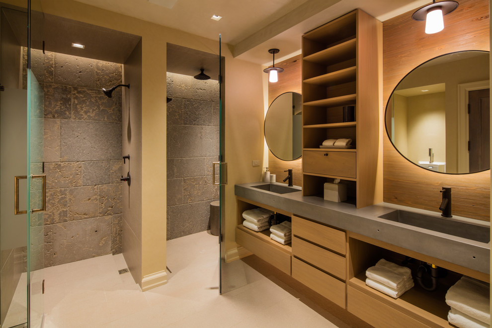 Design ideas for a traditional ensuite bathroom in Denver with open cabinets, light wood cabinets, a built-in shower, beige tiles, grey tiles, beige walls, an integrated sink and a hinged door.