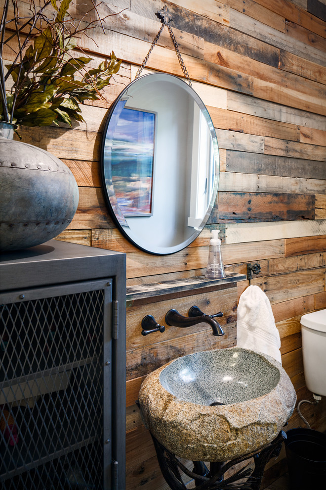 Photo of a medium sized rustic bathroom in Grand Rapids with a two-piece toilet.