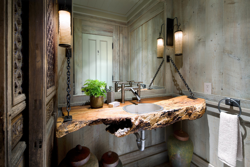 Inspiration for a coastal bathroom remodel in Other with a drop-in sink