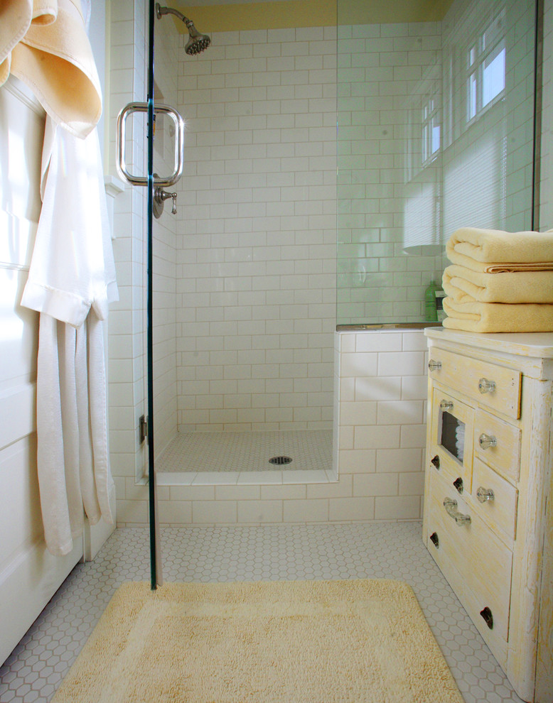 Small classic shower room bathroom in Portland with a pedestal sink, freestanding cabinets, distressed cabinets, wooden worktops, a one-piece toilet, white tiles, metro tiles, yellow walls and ceramic flooring.