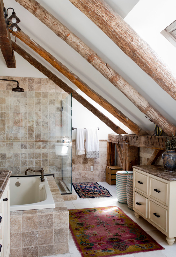 Example of an eclectic beige tile bathroom design in New York with white walls and brown countertops