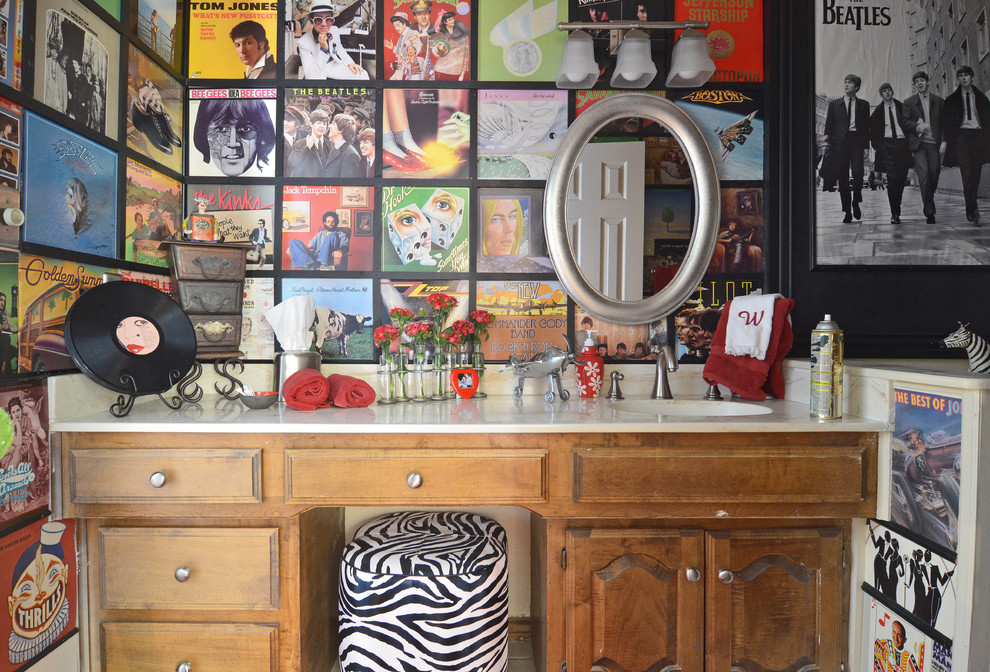 Example of an eclectic bathroom design in Dallas with an integrated sink