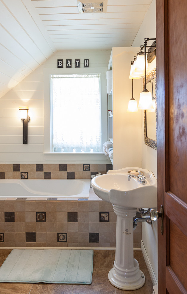 This is an example of a coastal bathroom in Other.