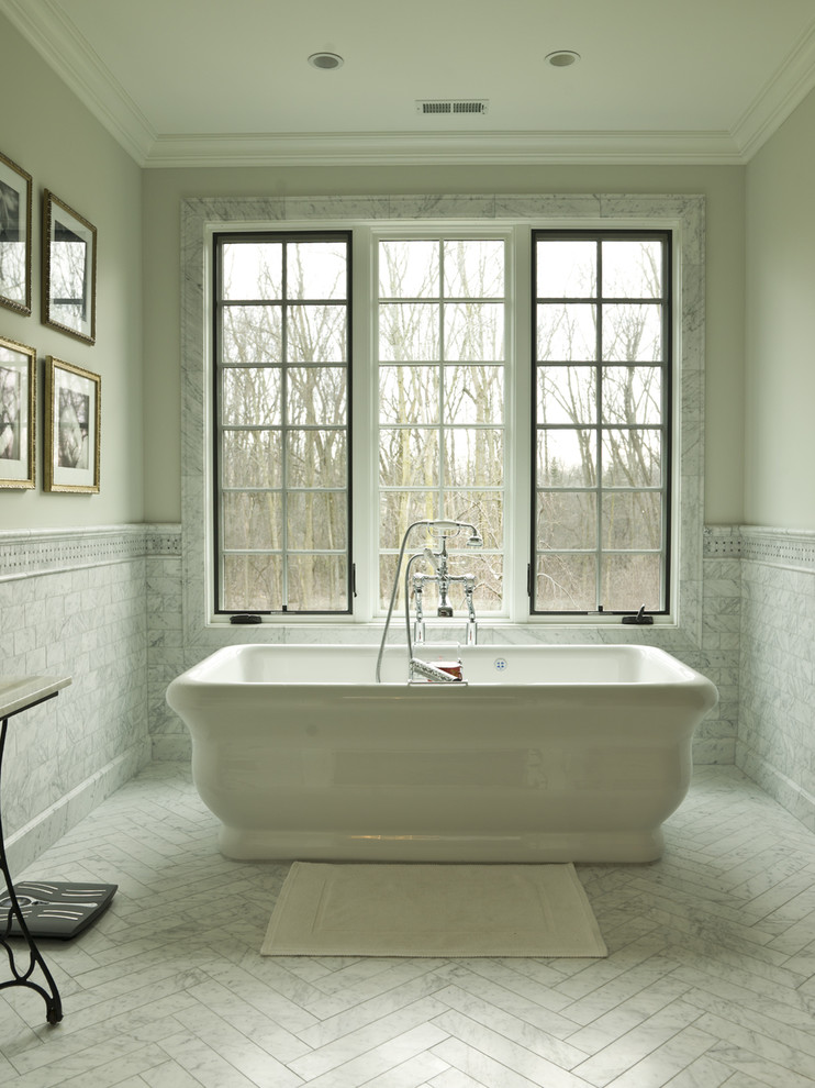 This is an example of a traditional bathroom in Chicago with a freestanding bath.