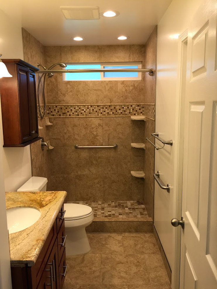 This is an example of a medium sized classic shower room bathroom in Hawaii with a built-in sink, recessed-panel cabinets, dark wood cabinets, granite worktops, an alcove shower, a one-piece toilet and multi-coloured walls.